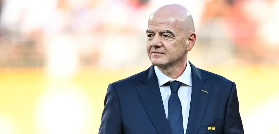 FIFA official in suit at sporting event