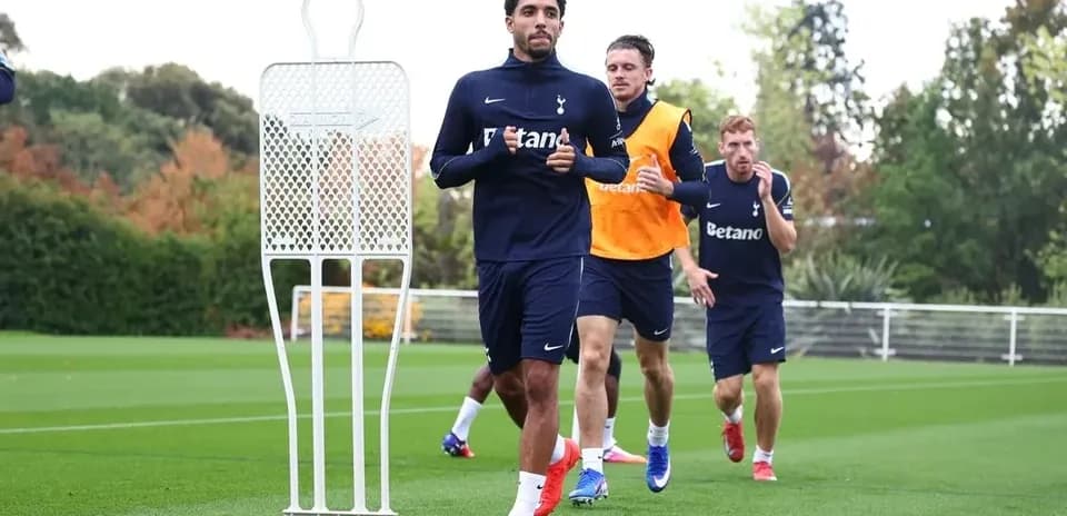 Players jogging during Tottenham training session