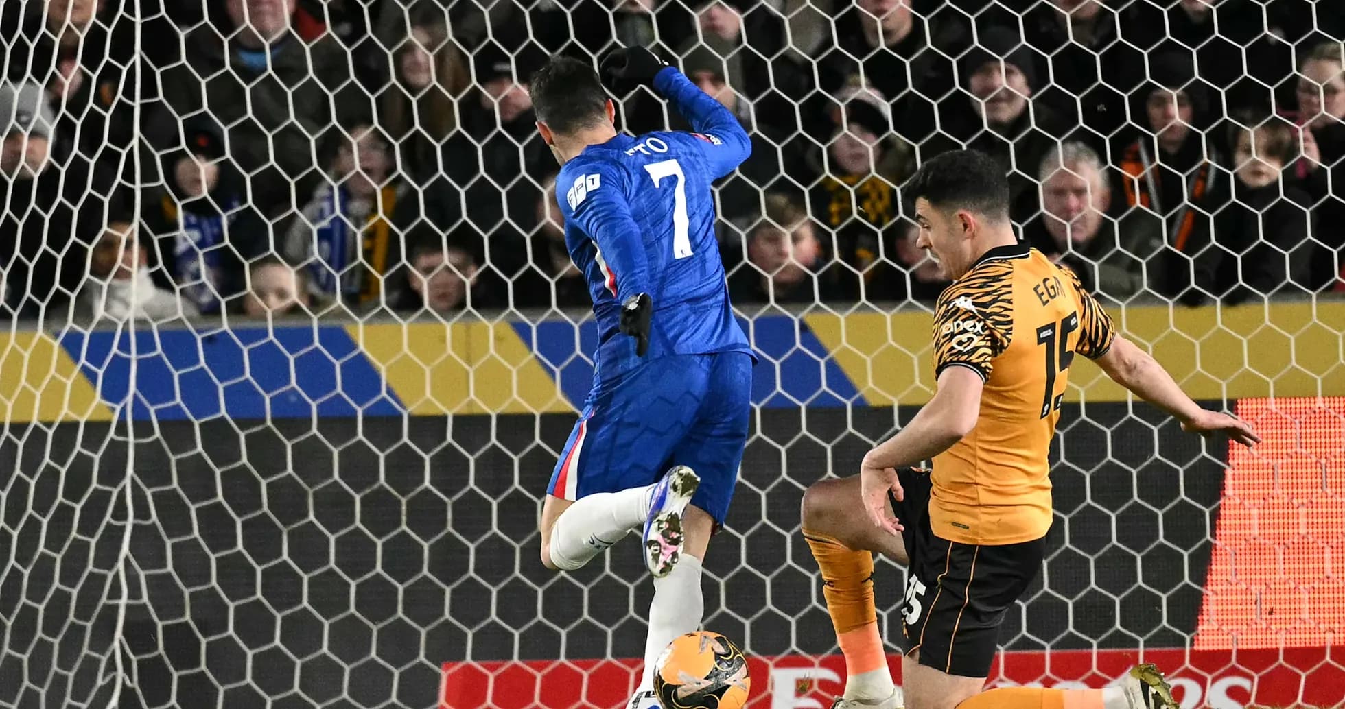 Player kicking ball during Chelsea vs Hull City match