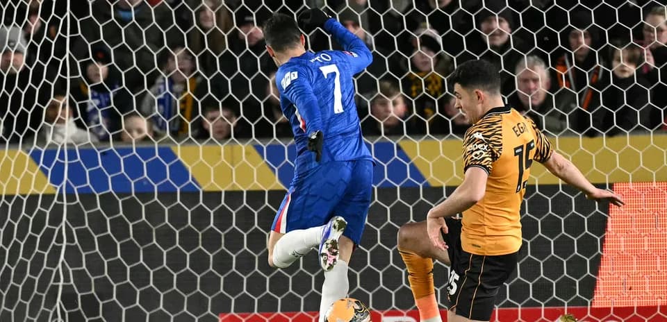 Player kicking ball during Chelsea vs Hull City match
