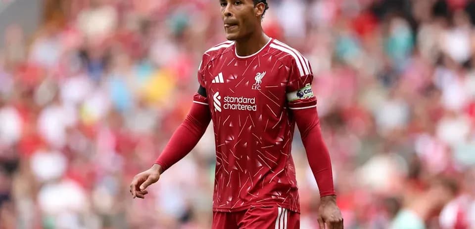 Player in red Liverpool kit during match