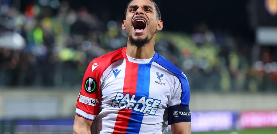 Player celebrating after scoring a goal for Crystal Palace
