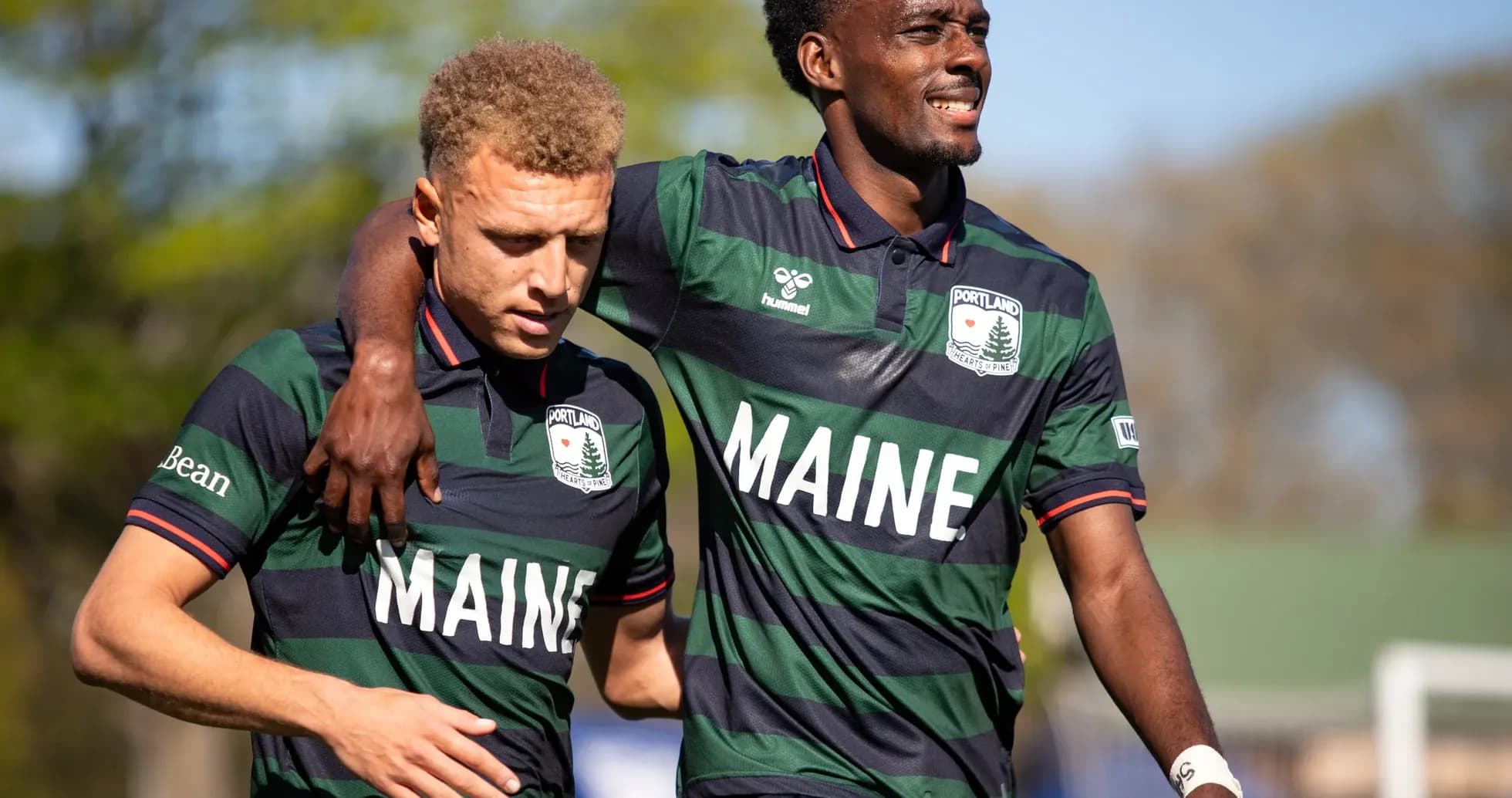 Portland Hearts of Pine players celebrating together