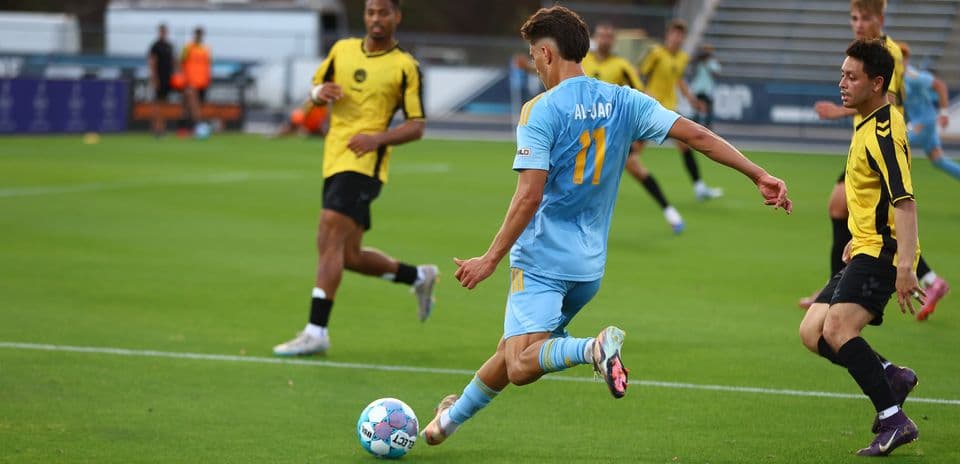 Player kicking ball during JAX vs Charleston match