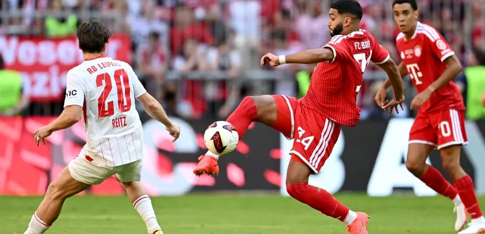 Player from Bayern Munich kicking the ball during match