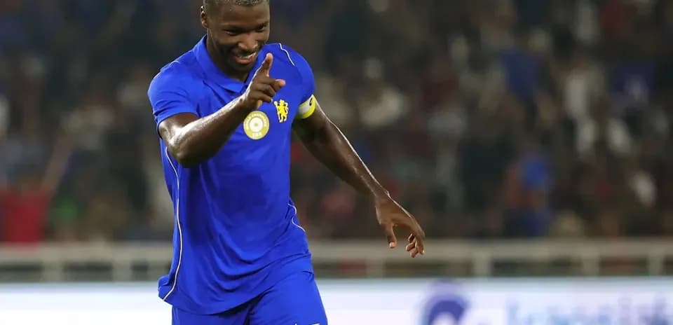 Player celebrating with a finger raised during match