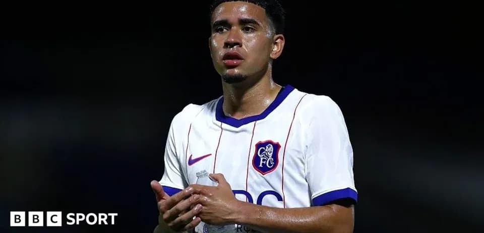 Player holding water bottle after match