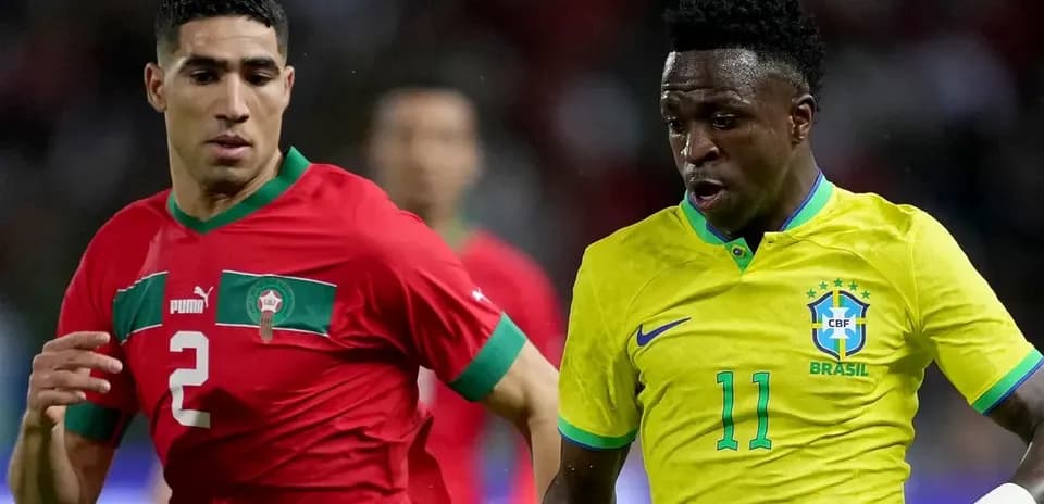 Achraf Hakimi and Vinícius Júnior in action