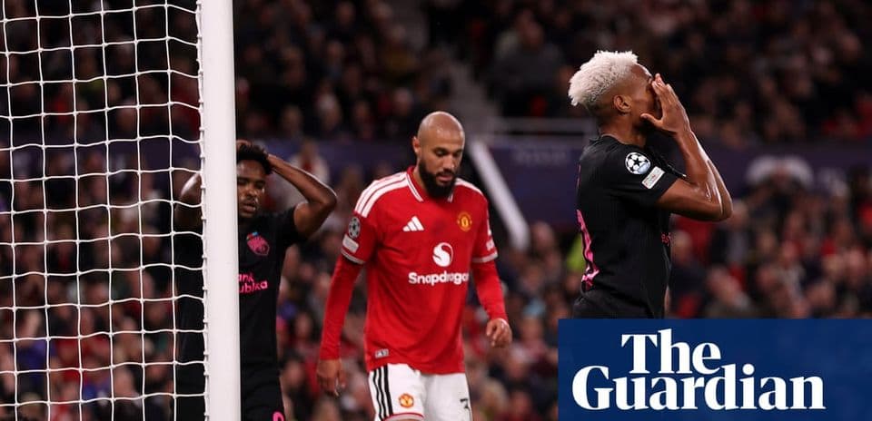 Players reacting during a Champions League match