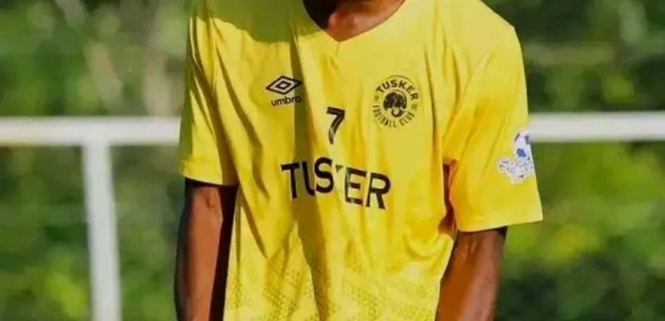 Player celebrating in yellow team jersey outdoors