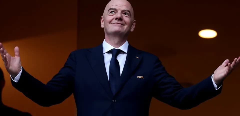 FIFA official gesturing during an event