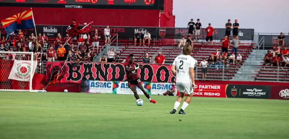 Player kicking ball during Phoenix Rising match