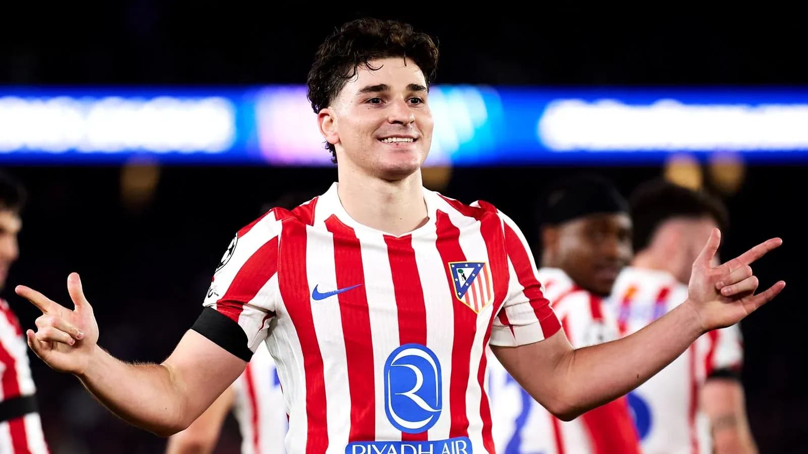 Atletico Madrid player celebrating on the pitch