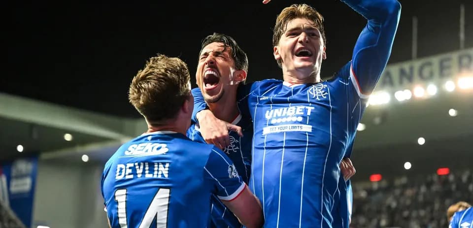 Rangers players celebrating a goal in match