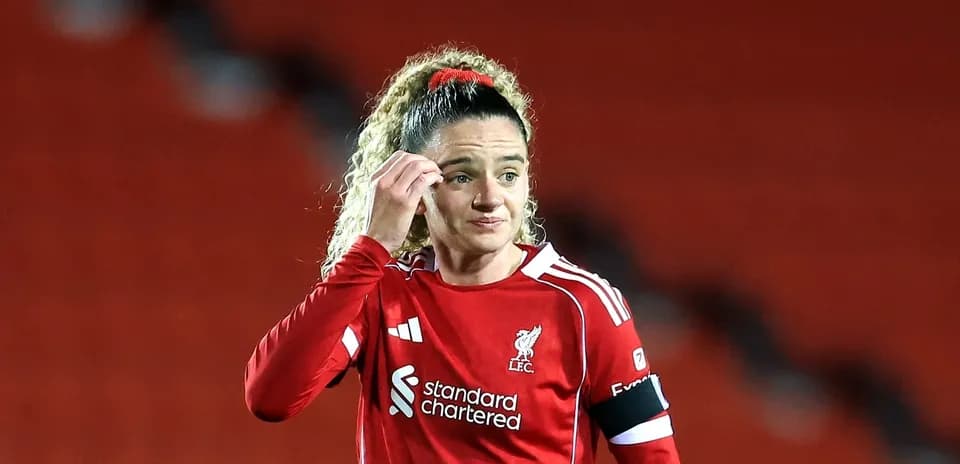 Female player in red Liverpool kit during match
