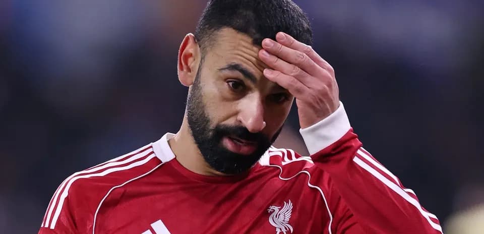 Player with hand on forehead during match