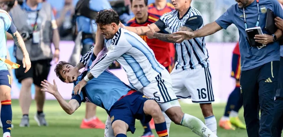 Players from Argentina and Spain in a scuffle