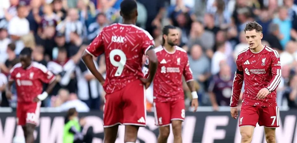 Liverpool players in red jerseys during match