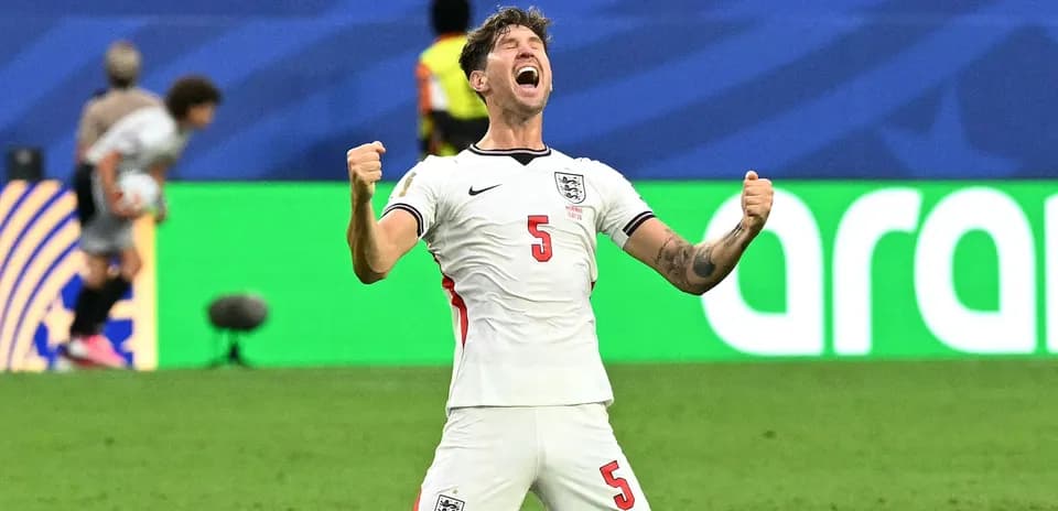 Player celebrating with fists raised on the field