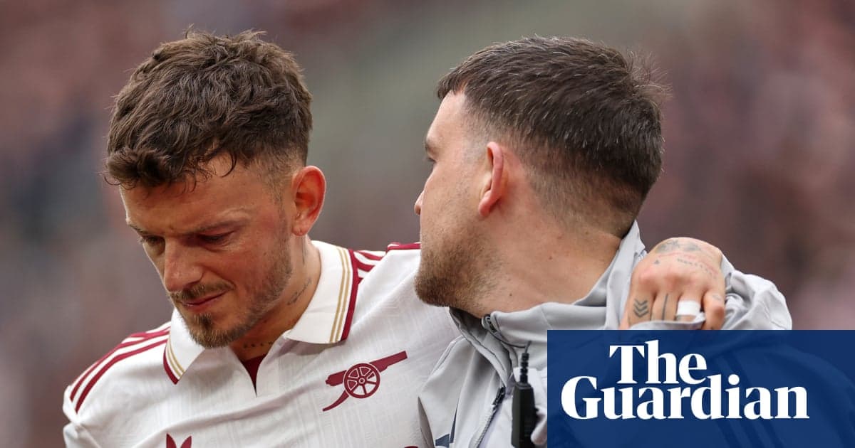 Player receiving support from teammate after injury