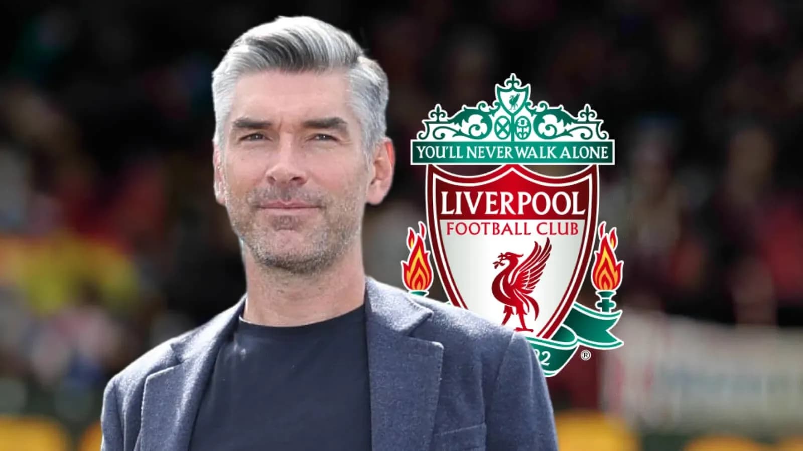 Man in front of Liverpool FC logo and slogan
