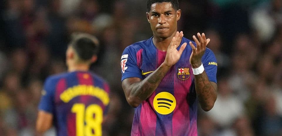 Player applauding during a Barcelona match