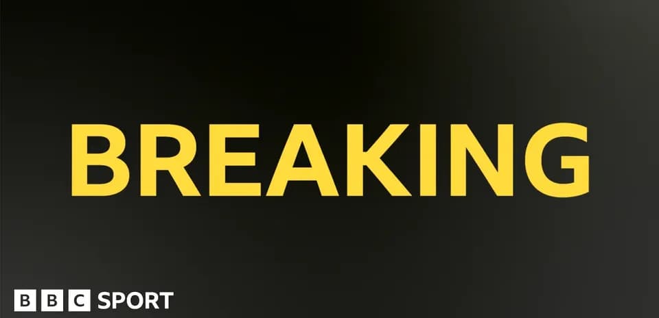 Breaking news announcement in bold yellow text