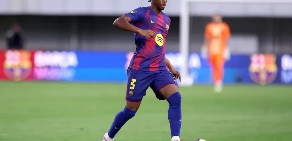 Player dribbling the ball on the pitch