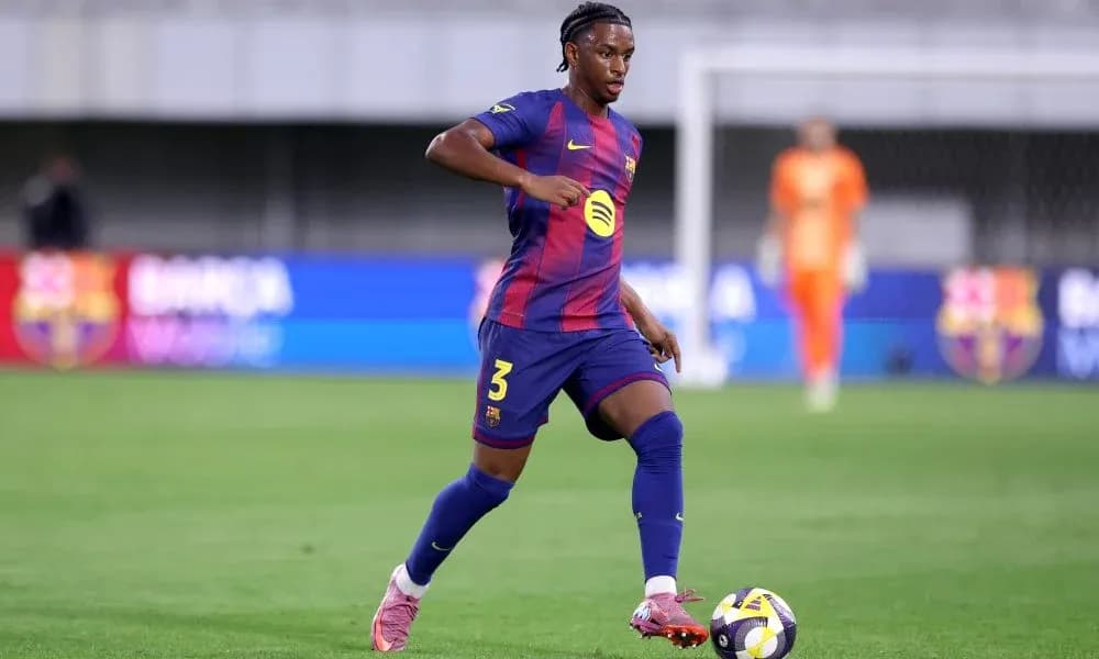 Player dribbling the ball on the pitch