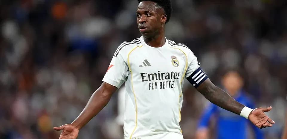Player gesturing during a match for Real Madrid