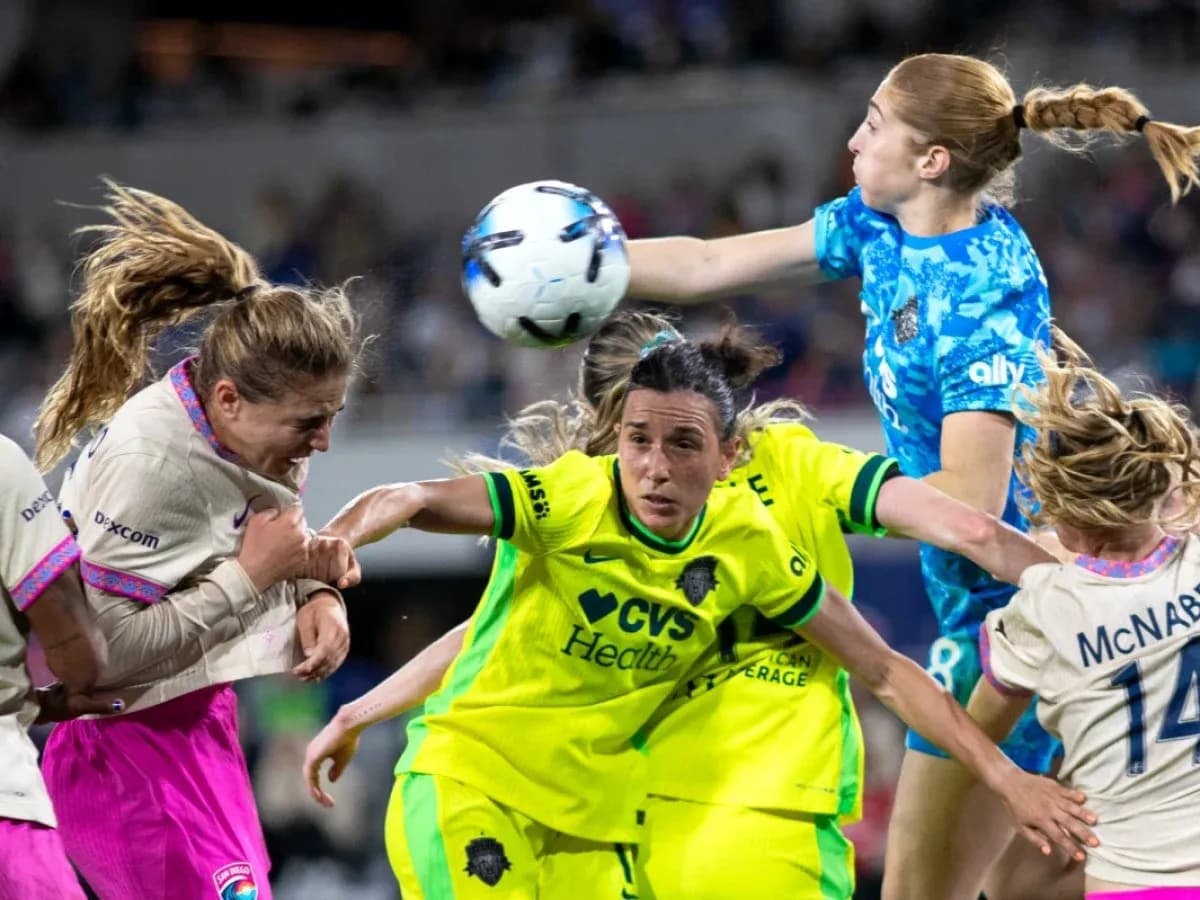 Goalkeeper catching ball during Houston Dash match