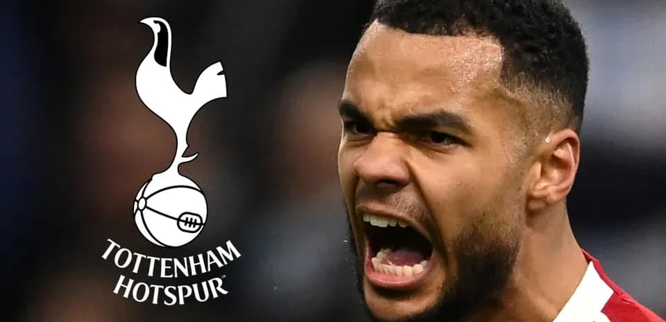 Player celebrating with Tottenham Hotspur logo in background