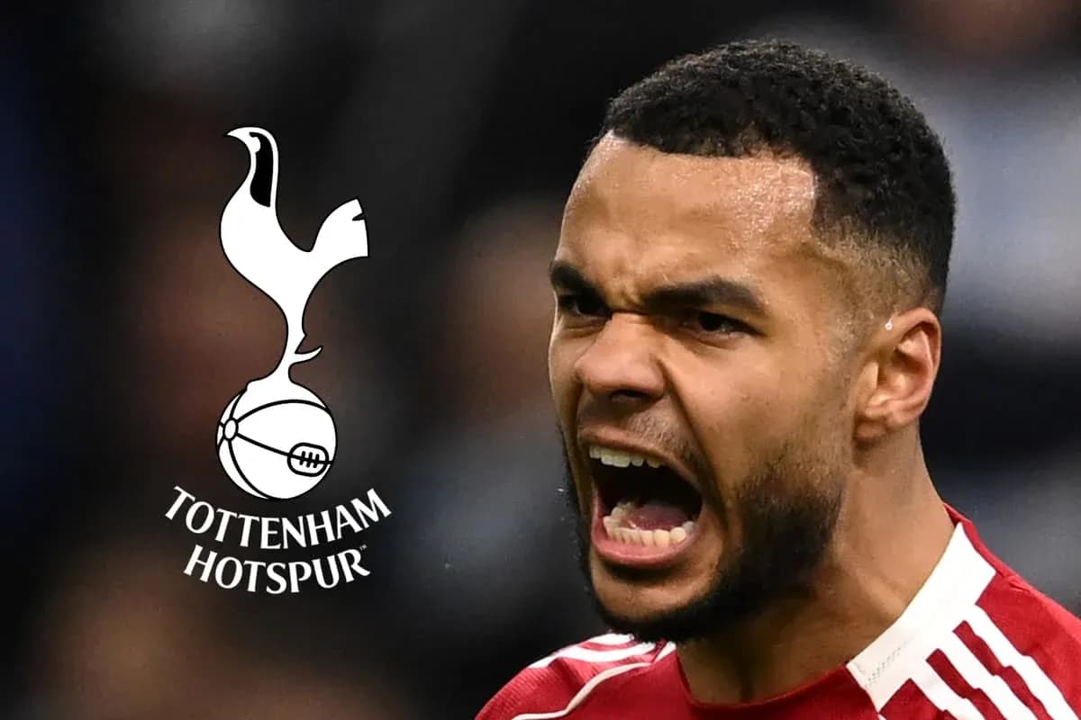 Player celebrating with Tottenham Hotspur logo in background