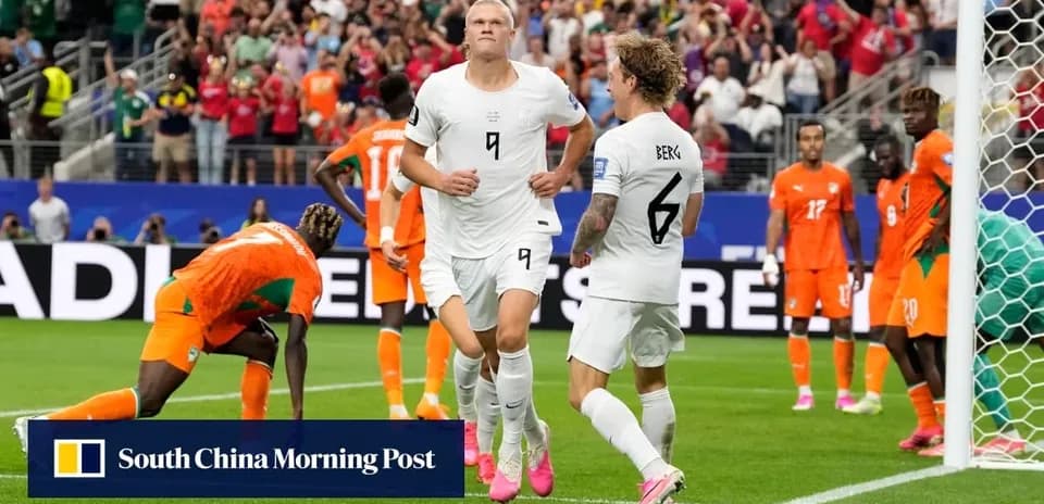 Players celebrating a goal during match action