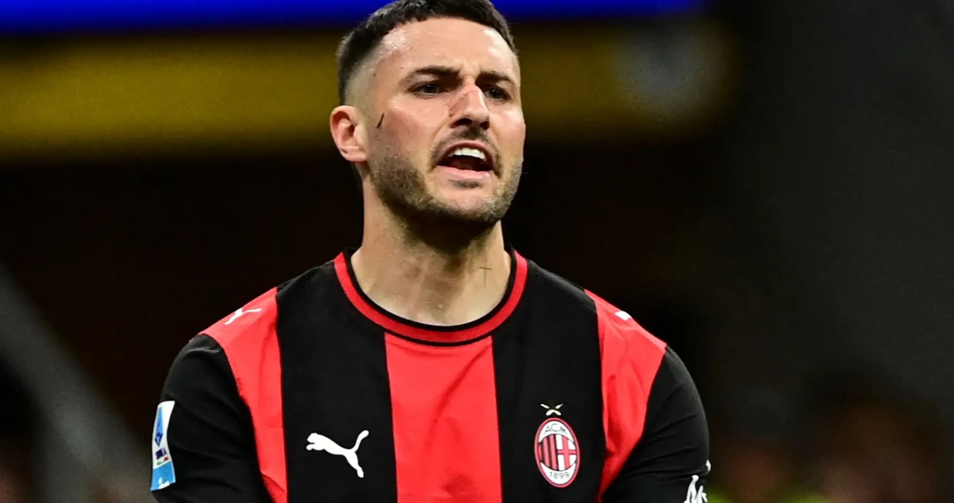 Player wearing AC Milan jersey during match