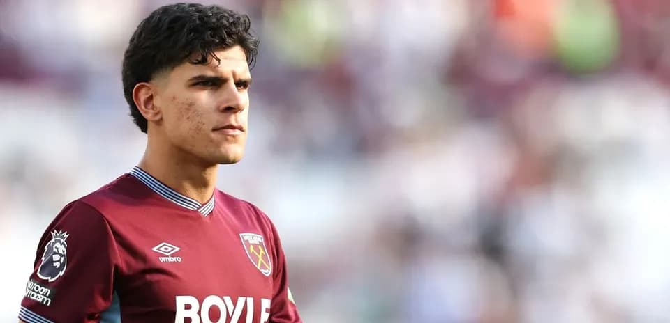 Player wearing West Ham United jersey on field