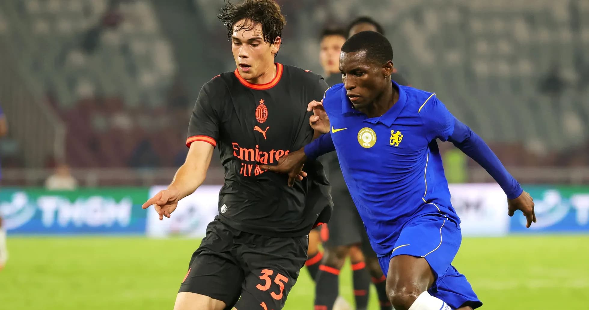 Two players contesting possession during a match