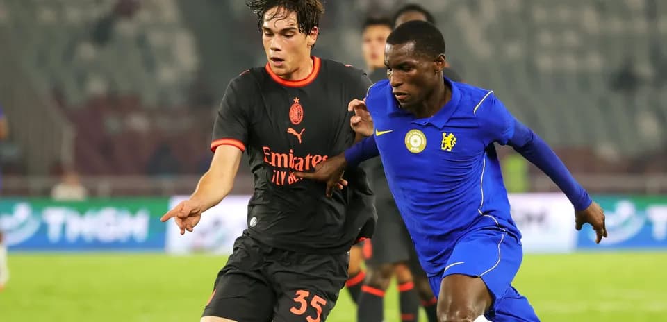 Two players contesting possession during a match