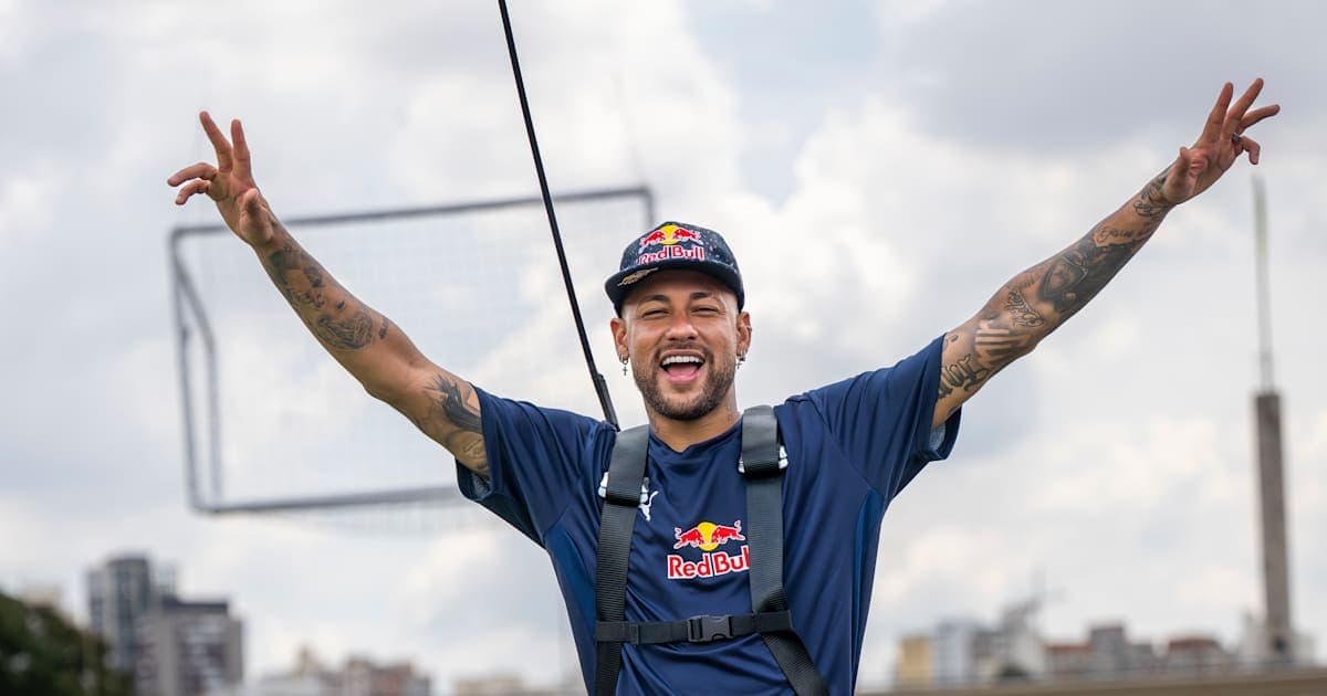 Neymar celebrating in a Red Bull event outdoors
