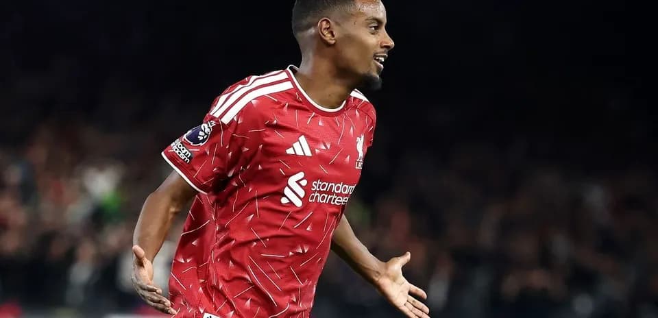 Player celebrating a goal in red team jersey