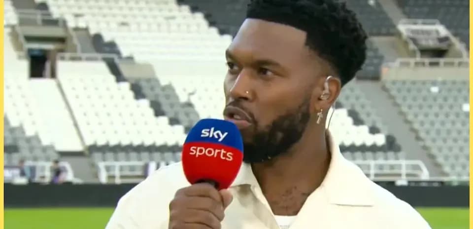 Sportscaster speaking during live broadcast at stadium