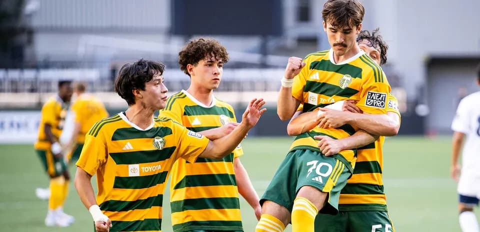 Portland Timbers II players celebrating a goal
