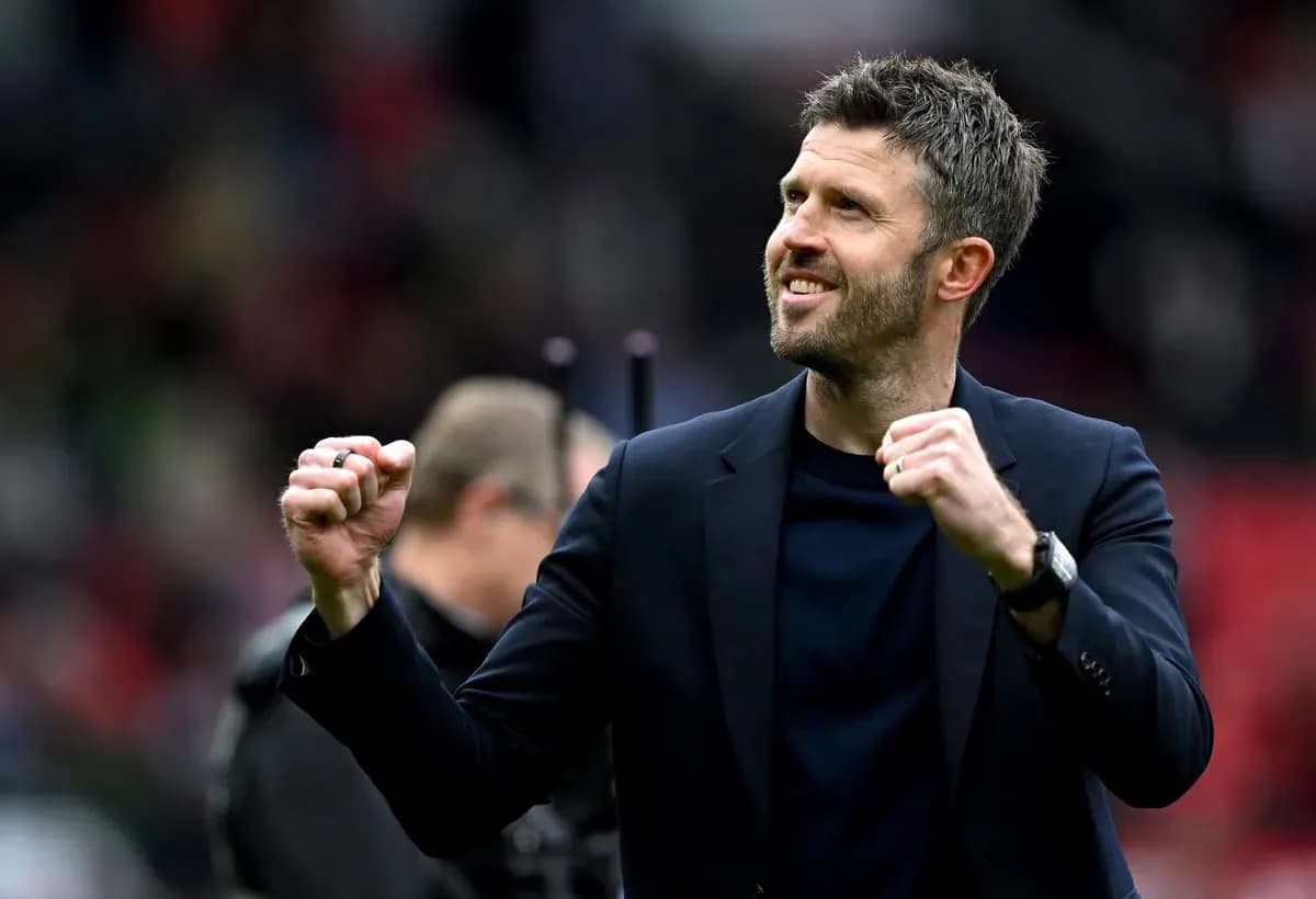 Manager celebrating enthusiastically after a match