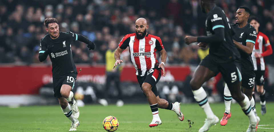 Liverpool player chasing the ball against Brentford