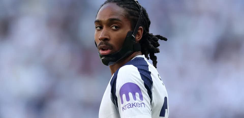 Player wearing a mask during a football match