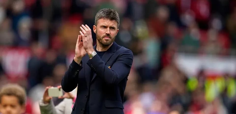 Coach applauding fans after the match