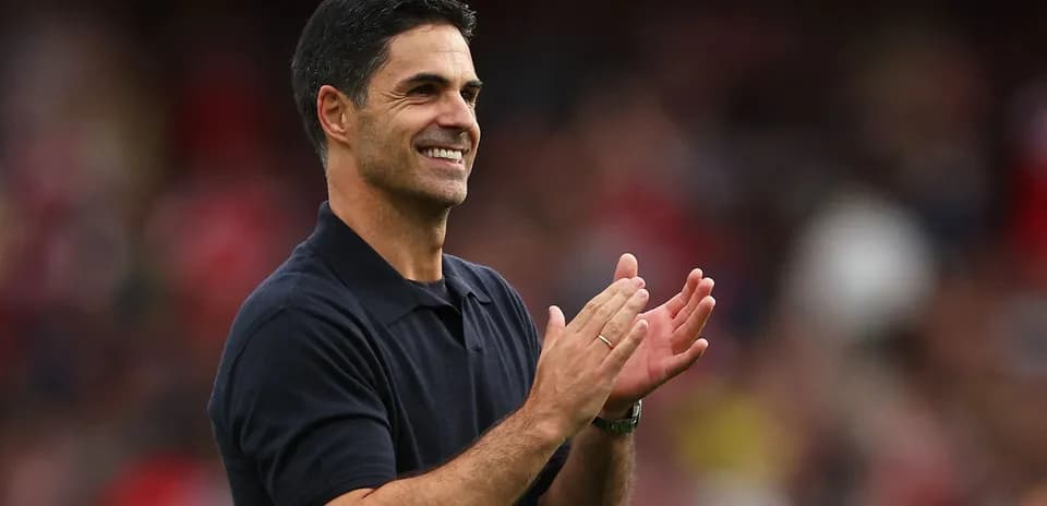 Coach applauding during a match celebration