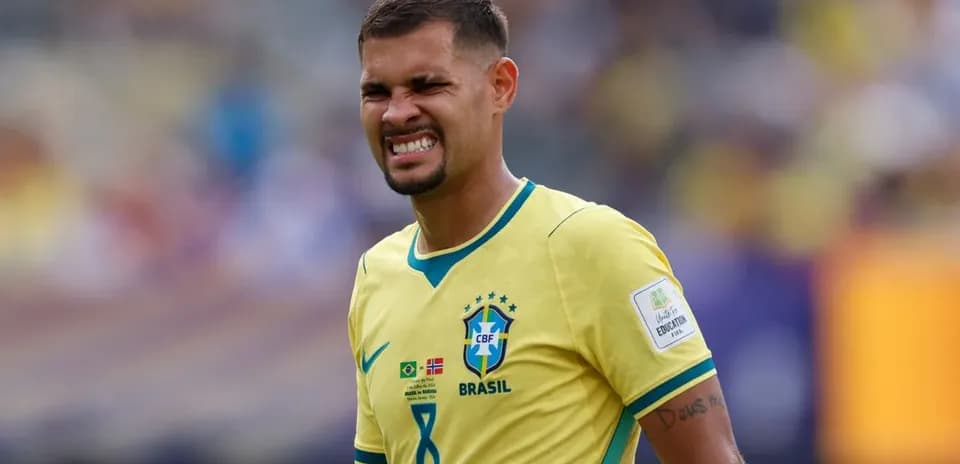 Brazilian player grimacing during a match