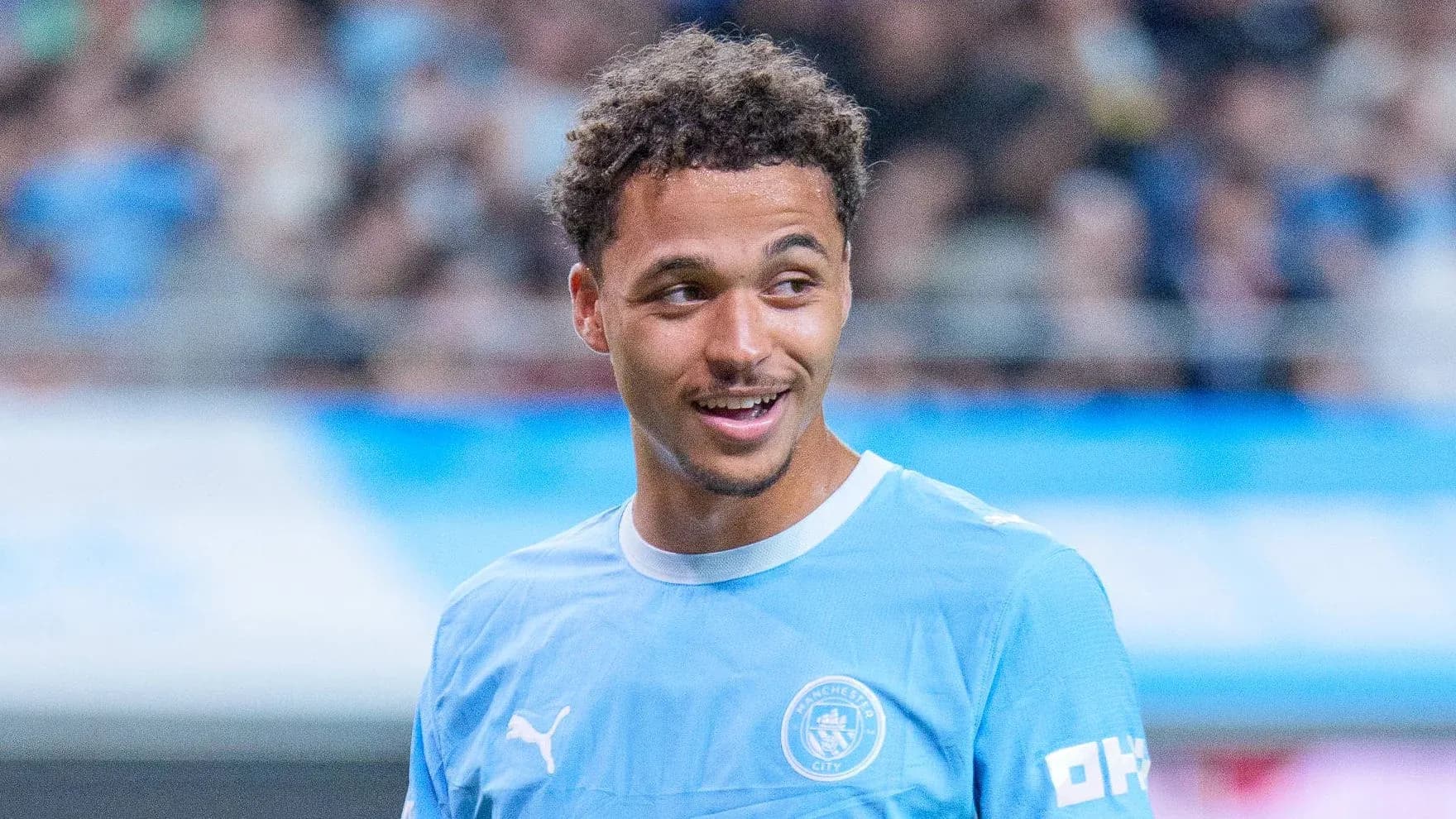 Player smiling during warm-up before match