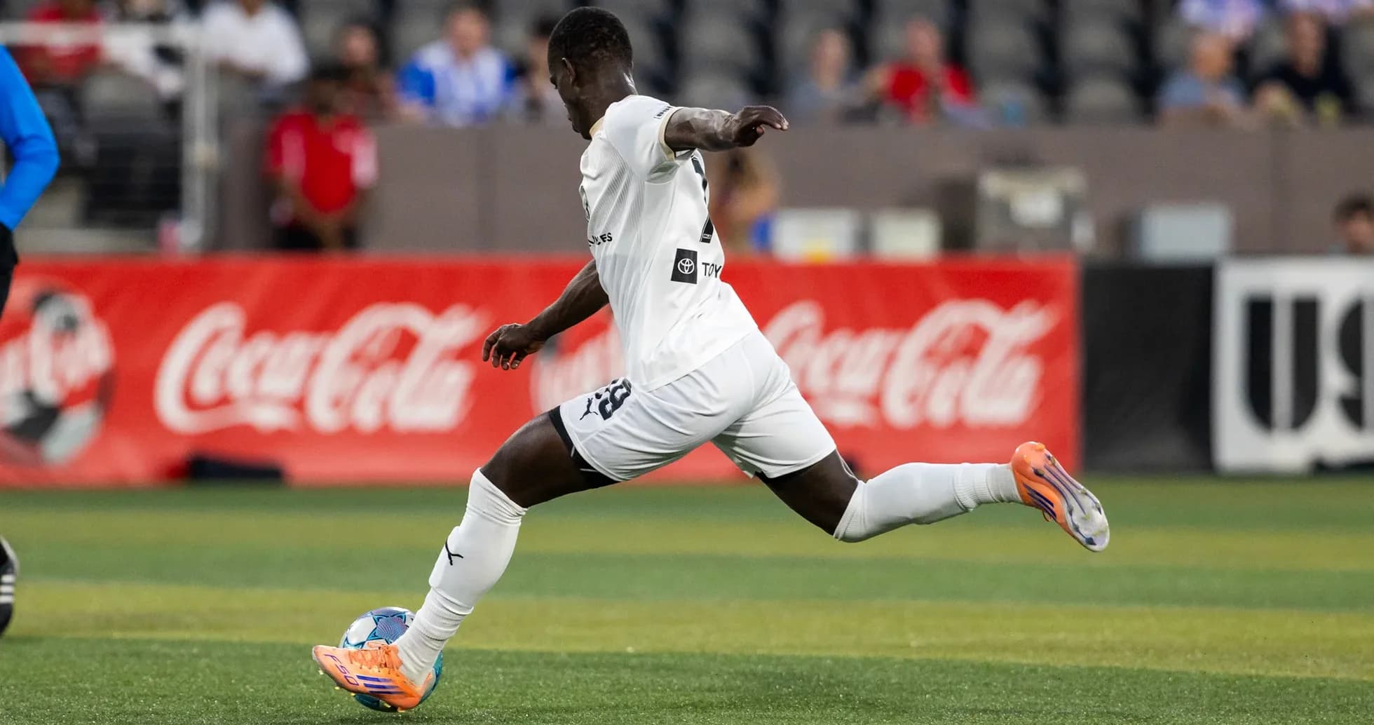 Player in white kit during USL Championship match